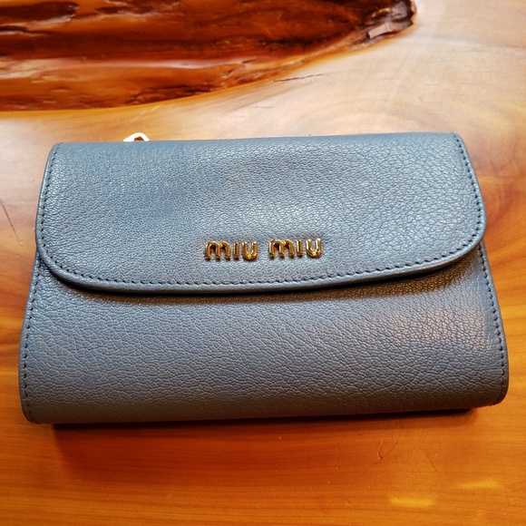Miu Miu Handbags - Offer💕 Authentic Miu Miu blue compact wallet EUC
